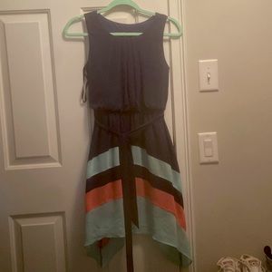 Navy blue dress with bottom section consisting of colors; coral, and mint